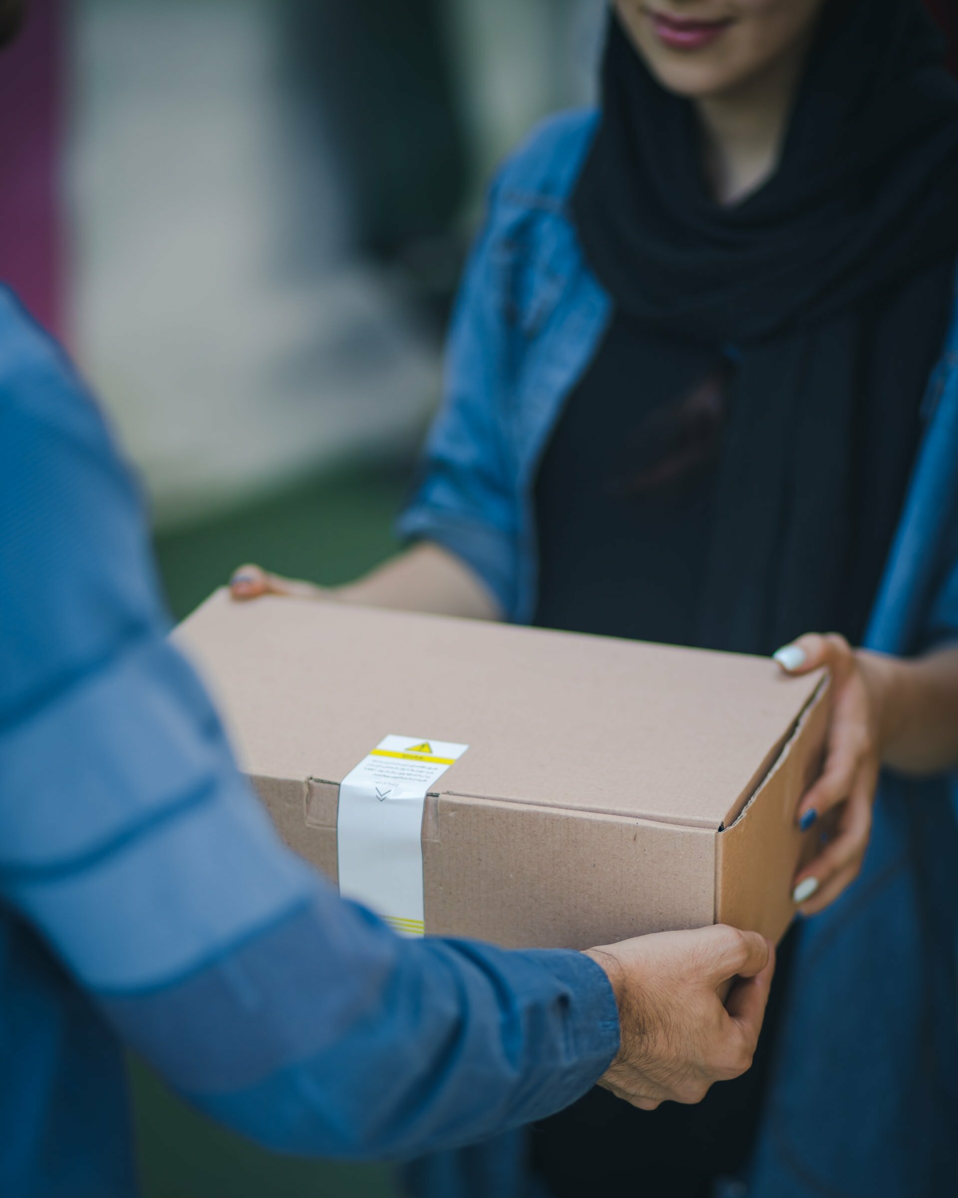 a person holding a box