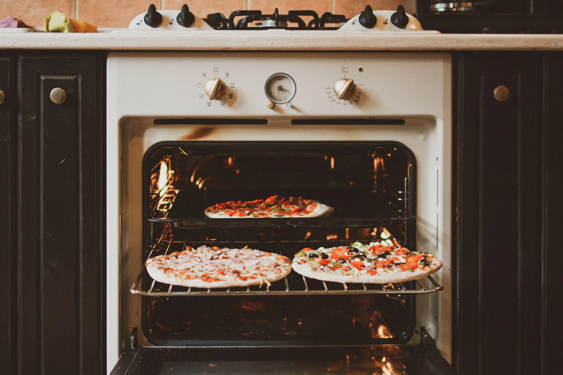 pizzas in an oven