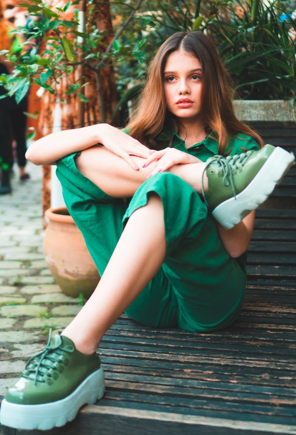 a person sitting on a bench