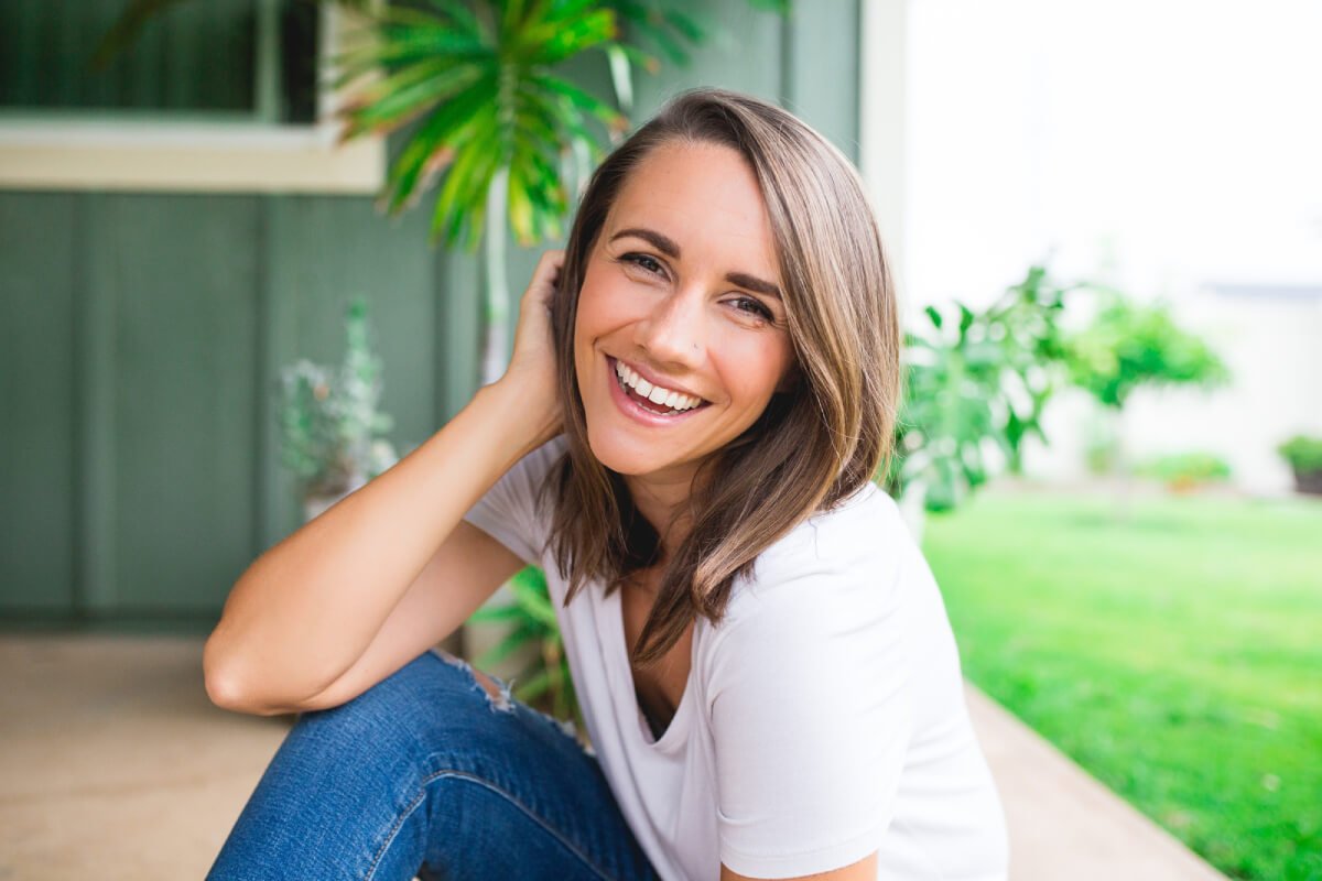 a woman smiling at the camera