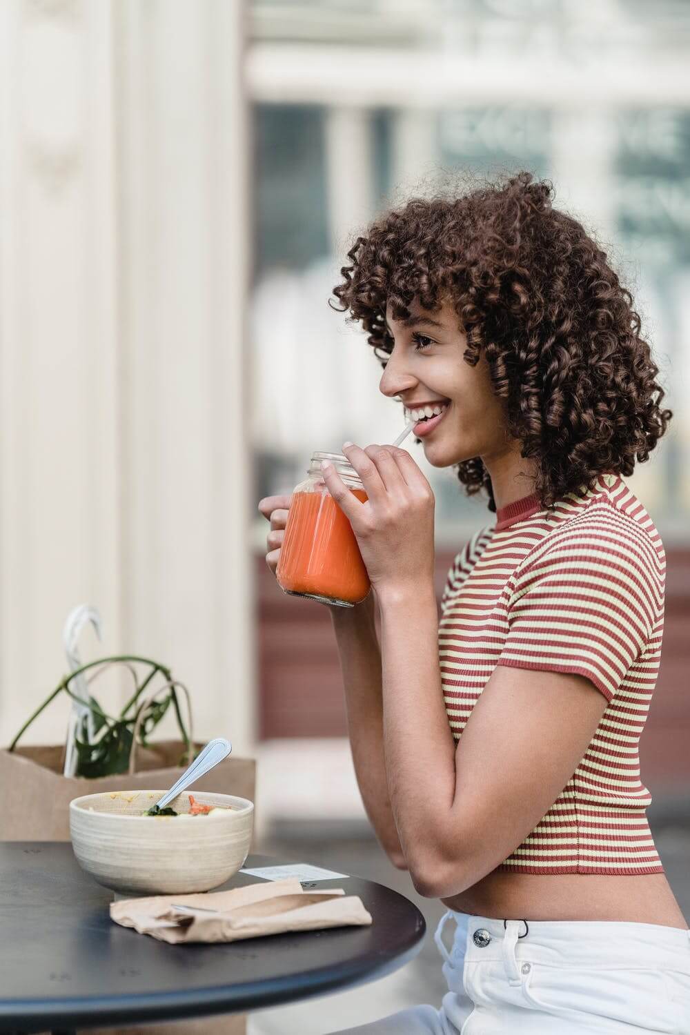 a person eating a bowl of cereal