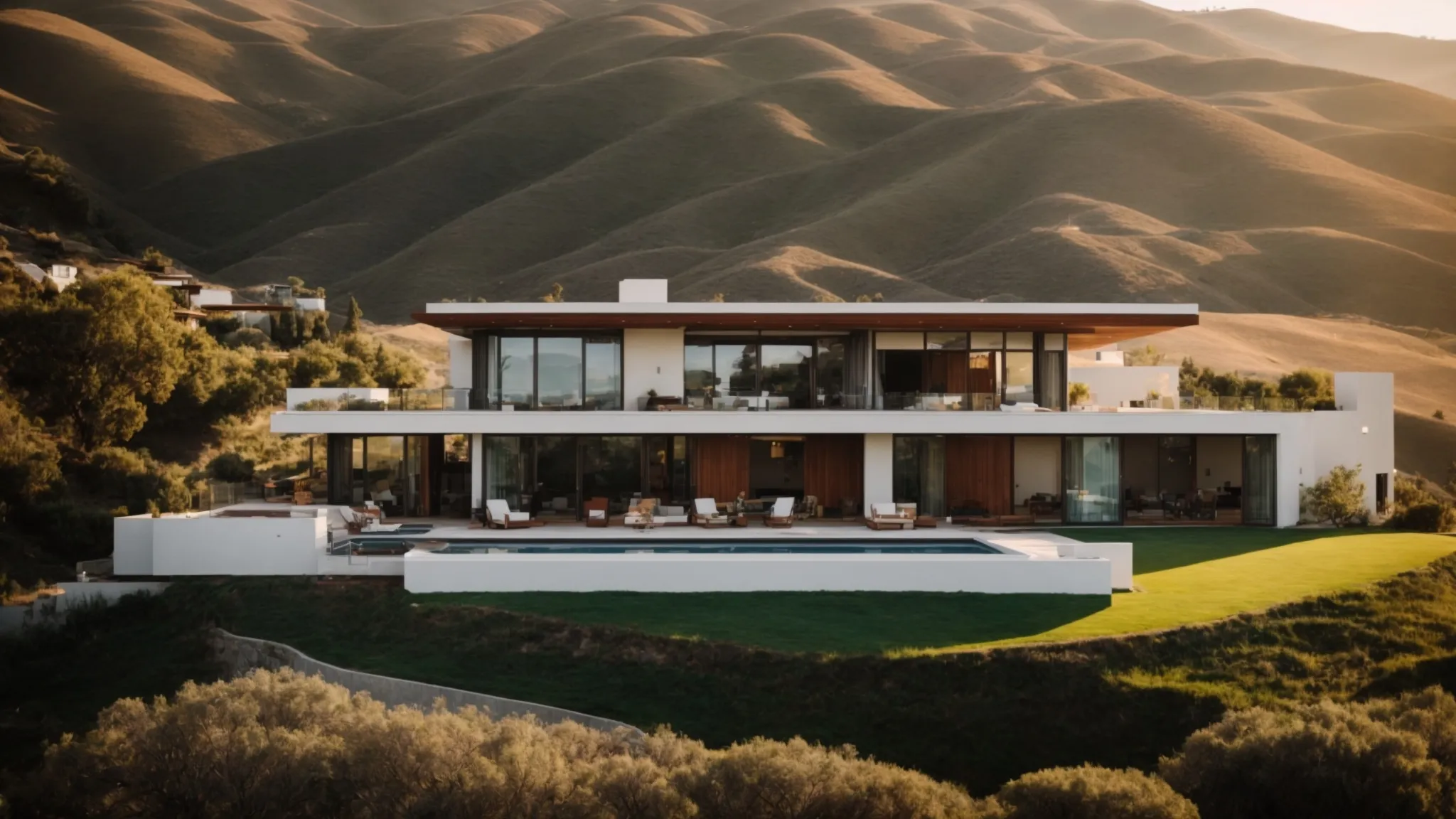 a sprawling modern mansion under the californian sun, nestled into hills overlooking the city.